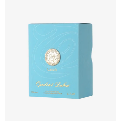 Light blue rectangular box for lattafa opulent dubai unisex fragrance featuring gold-embossed logo and elegant script
