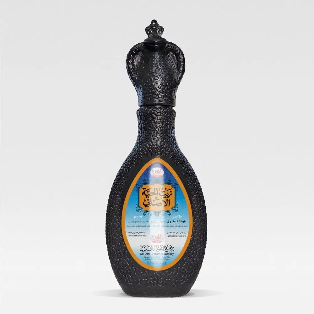Black textured perfume bottle with ornate crown stopper and gold trim for original snake oil hair treatment 165ml