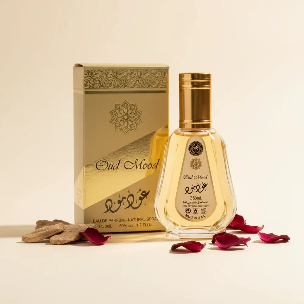 Oud Mood perfume bottle and packaging on a white background
