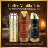 Three coffee-themed perfumed body spray bottles labeled Khamrah, Khamrah Qahwa, and Bint Hooran, arranged together under the title 'Coffee Vanilla Trio' on a warm brown background with candlelight and steam imagery.
