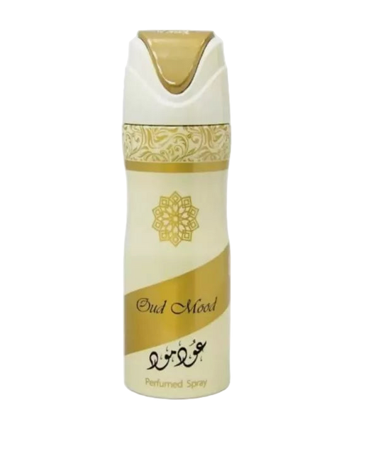 Perfume spray bottle with gold and white design on a white background