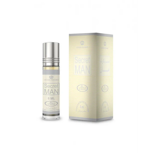 Silver-topped roll-on concentrated perfume oil secret man by crown perfumes in clear glass 6ml bottle with gray label