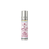 A sleek glass rollerball bottle with silver cap and pink label containing 6ml sukkar banat concentrated perfume oil