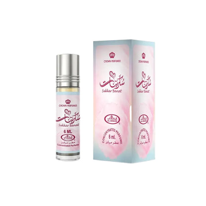 A sleek silver-topped glass rollerball bottle of sukkar banat concentrated perfume oil with a pink and white arabic label
