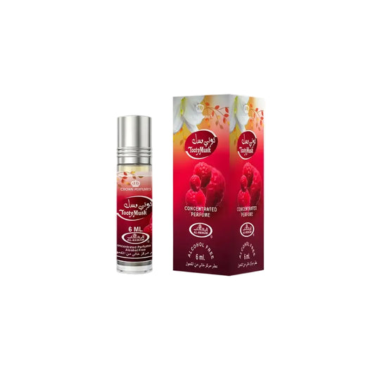 A sleek transparent glass rollerball bottle with silver cap and red label for tooty musk fruity floral noor east scent