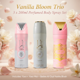 Three perfume body spray bottles from the Yara brand arranged together under the text 'Vanilla Bloom Trio 3 x 200ml Perfumed Body Spray Set.' The bottles are pink, white, and gold-toned, with floral decorations in the background.