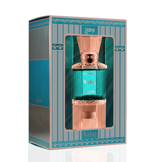 A boxed perfume bottle labeled Wahaj, shown in its retail packaging. The box is teal and metallic silver with a clear front window revealing the bottle.Wahaj Concentrated Perfume Oil 20ml – Nabeel