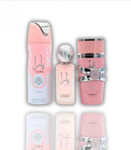 Lattafa Yara Collection Gift Set – Perfume 100ml, Body Spray 200ml & Air Freshener 300ml. Fruity floral vanilla scent, long-lasting & elegant.